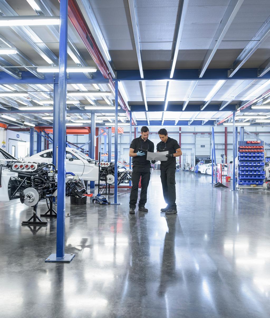 Engineers working on automotive